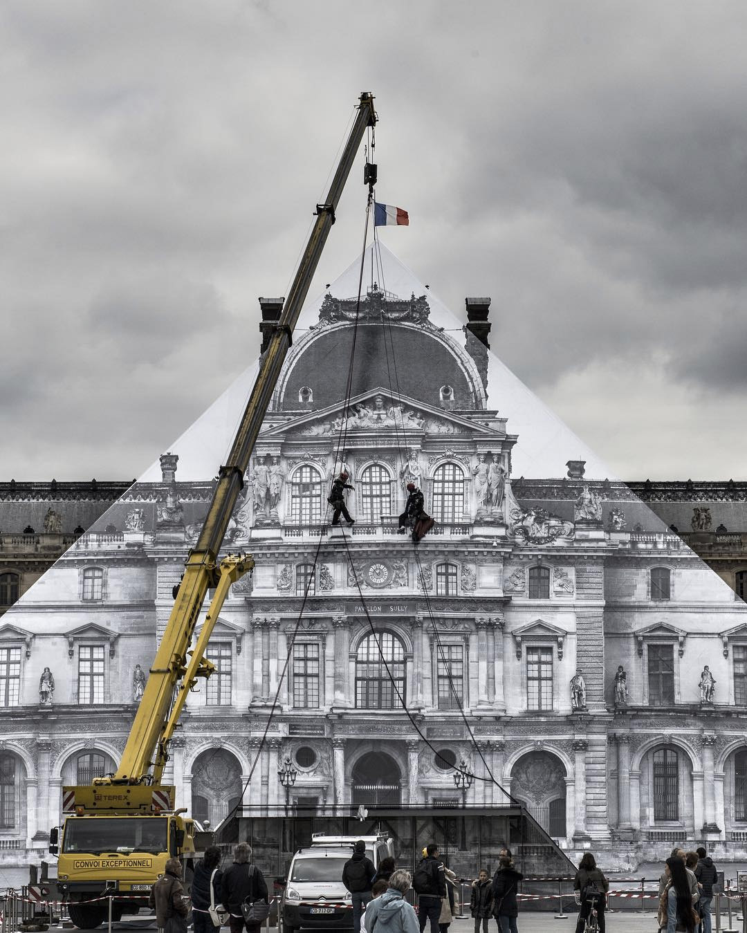 Artist JR Makes the Louvre’s Glass Pyramid Disappear